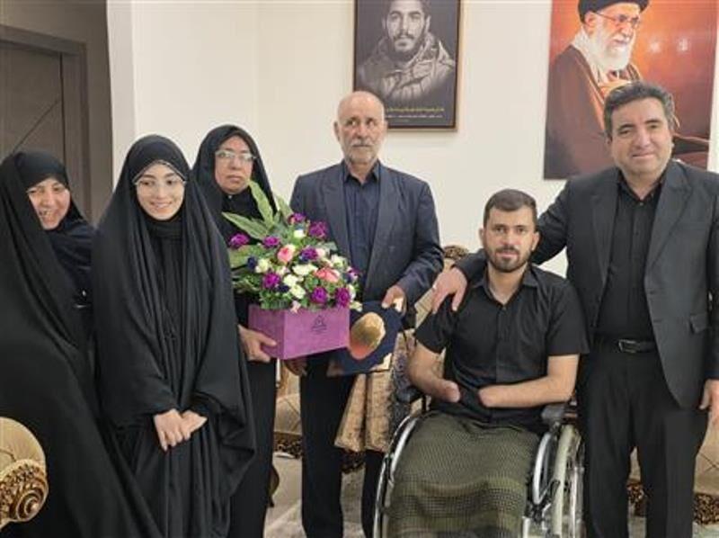 دیدار معاون قوه قضائیه با حسین محمدی جانباز جنگ رمضان در کرمانشاه
